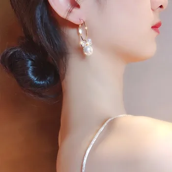 Modno Elegantna Kaplja Vode lep biser uhani sladko korejski sijoče kovine bowknot Ženske Spusti Nakit uhani